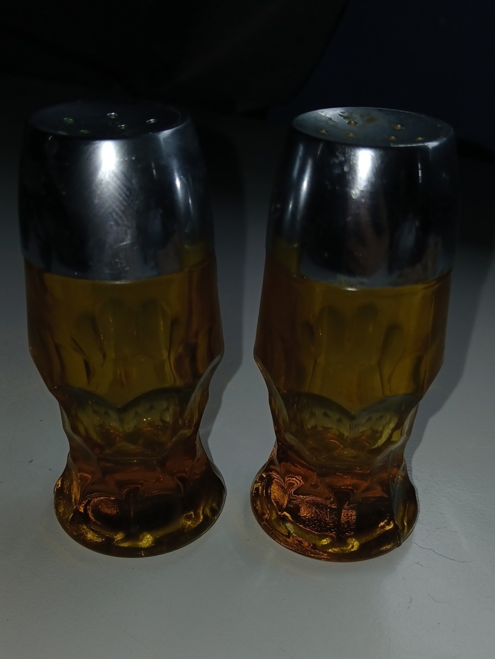 Amber Glass Salt and Pepper Shakers with Silver Tops
